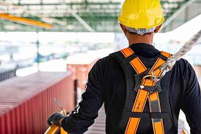 Dock Worker Wearing Safety Harness