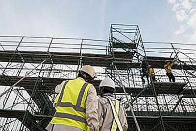 Construction Workers on Scaffolding