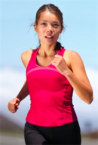 Woman Jogging Outdoors in Athletic Wear