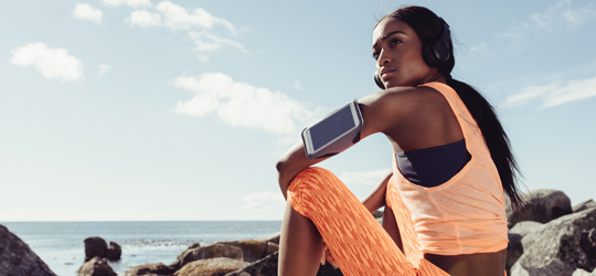 Girl on a rocky beach