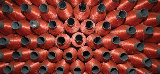 stacked skeins of thread
