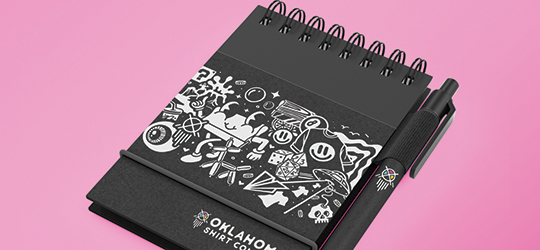 promotional notebook and pen with printed design and logo
