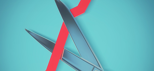 pair of scissors cutting a red line