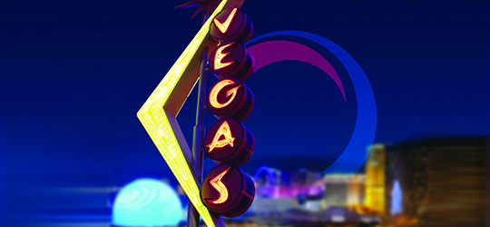 a neon sign that reads "vegas"