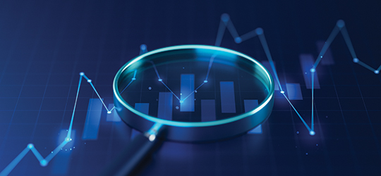 digital graphic of a magnifying glass laying on top of a bar graph