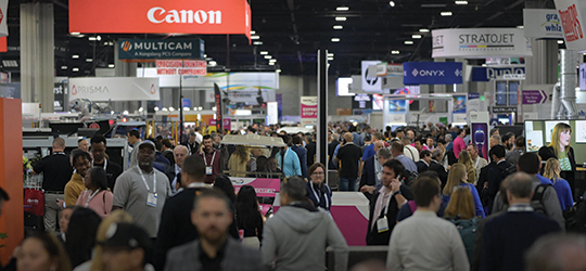 sea of people on the show floor at PRINTING United Expo 2023
