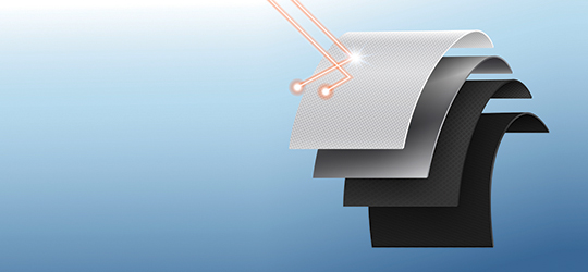 a red laser beam bounces off the top layer of a textile